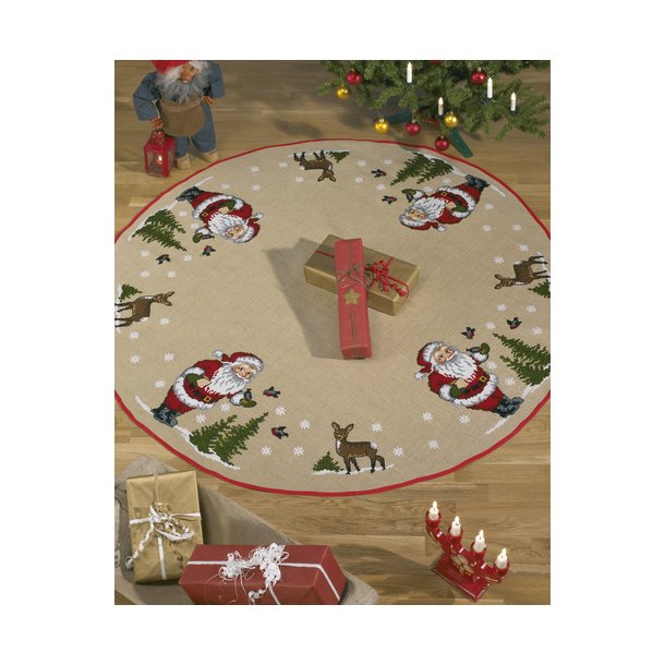 Nisse fodrer fugle juletrstppe