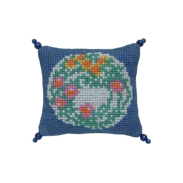 Blomsterkrans p bl bund